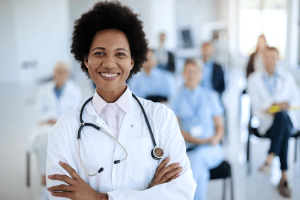portrait confident black doctor standing 600nw 1824402155